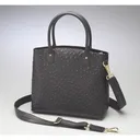 GUN TOTE'N MAMAS Town Tote Black Ostrich Pattern - Gun Tote'n Mamas
