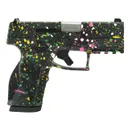 Taurus GX2 Multi Color Paint Splatter 9mm 3.38 Barrel 13-Rounds - Taurus